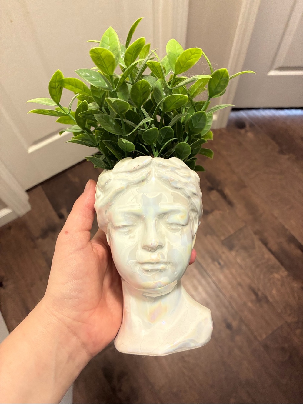 Iridescent White Ceramic Bust Vase with Green Faux Foliage